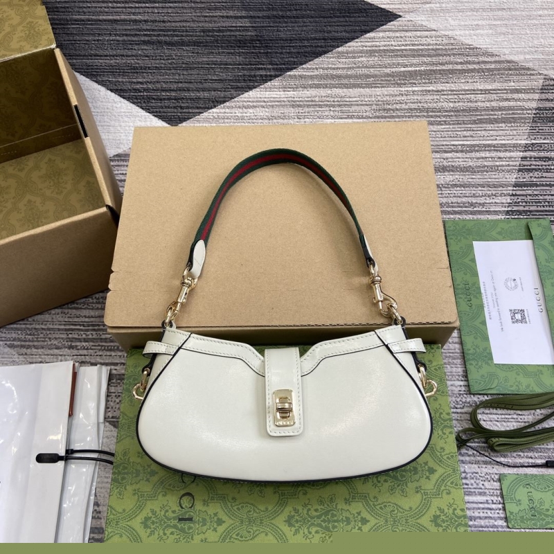 G*u*i top handle bags